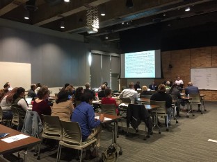 A large audience at the Navigating Civic Distrust conference in Flint, Michigan