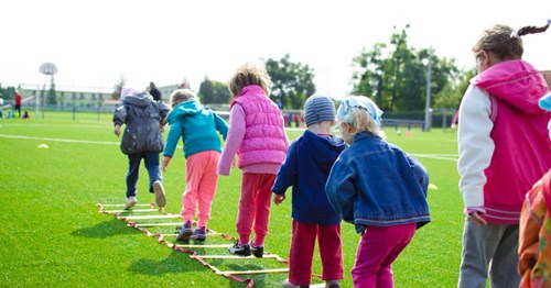 Kids playing in a field